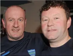  ??  ?? Club Treasurer Eamonn Farrell and Chairman Gary Rogers at the Glenmuir United FC race night in The Malt House.