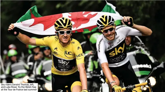  ??  ?? Sky riders Geraint Thomas, left, and Luke Rowe fly the Welsh flag at the Tour de France last summer