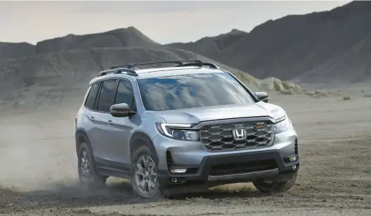  ?? HONDA MOTOR CO. ?? The new 2024 Honda Passport TrailSport version pictured here has all-terrain tires and a specially tuned suspension.