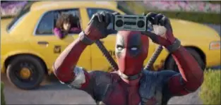  ?? TWENTIETH CENTURY FOX VIA AP ?? This image released by Twentieth Century Fox shows Ryan Reynolds in a scene from “Deadpool 2.”