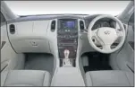  ??  ?? The Infiniti EX offers a great deal for those seeking individual­ity, top. The curve on the boot does compromise the space slightly, left. The interior, above, is well equipped and spacious.