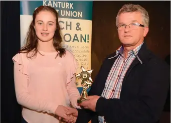  ??  ?? Cathy Byrnes, Dromtarife, solo music winner pictured with Liam Buckley, Chairman, Duhallow Scór after their victory in the Kanturk Credit Union Duhallow Scór na nÓg Final. Picture John Tarrant