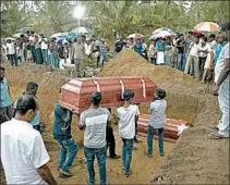  ?? GEMUNU AMARASINGH­E/AP ?? Relatives carry the coffin of one of three family members who died in the Easter bombing at a church in Negombo.