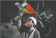  ?? AP photo ?? A cleric chants slogans during an anti-Israeli gathering in front of the British Embassy in Tehran, Iran, early Sunday. Iran launched its first direct military attack against Israel on Saturday.