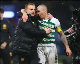  ??  ?? Celtic manager Neil Lennon, left, with his captain Scott Brown