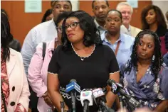  ?? Photos by Houston Chronicle via AP ?? ■ BELOW LEFT: Donna Poe, the mother of Lydell Grant, talks Tuesday during a press conference in Houston after her son was ordered to be released.