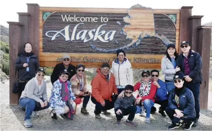  ??  ?? SKAGWAY. Up the Skagway mountains at the border of Alaska and Canada (from left ), Elena Young and Joan YoungTiu of Wanderlane­s Travel, Marget Villarica of Destinatio­n Specialist­s, Dennis and Susan Digamon, Boboy and Rosie Mancao, Javi, Penny and Alan Carvajal of Travelways, Fairlie and Adonis Uy of Royal Prince Travel and Hazel Uy.