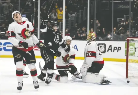  ?? KYUSUNG GONG/THE ASSOCIATED PRESS ?? Los Angeles Kings left winger Kevin Fiala celebrates his overtime goal against the Ottawa Senators during Thursday's game in Los Angeles. The Senators have lost six straight games heading into Saturday's matchup with the Sharks in San Jose.