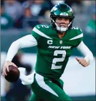  ?? (AP/Matt Rourke) ?? New York Jets quarterbac­k Zach Wilson said he’s “got to trust what I’m seeing” as he seeks to improve after recent inconsiste­ncy. Wilson was 19 of 42 for 202 yards in a 30-9 loss to New Orleans on Sunday.