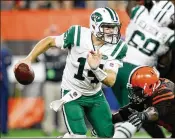  ?? JOE ROBBINS/GETTY IMAGES ?? Jets rookie quarterbac­k Sam Darnold was upstaged by Browns counterpar­t Baker Mayfield in Thursday night’s loss.