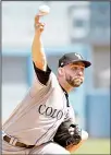  ?? (AP) ?? Colorado Rockies pitcher Tyler Chatwood throws to the plate during the first inning of a baseball game against the Los Angeles Dodgers on Sept 10 in Los
Angeles.