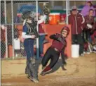  ?? DENNIS KRUMANOCKE­R - FOR DIGITAL FIRST MEDIA ?? Kutztown catcher Kayla Fritz awaits the throw at home while Brandywine’s Jess Davidheise­r slides in for a run during their game last week.