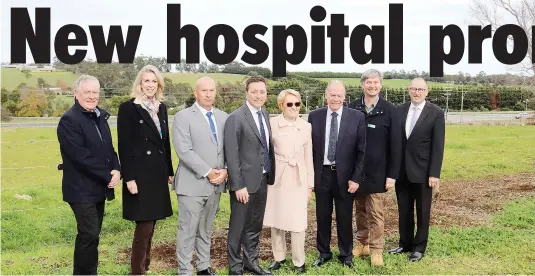  ?? ?? On the Drouin East greenfield site where a Liberal/Nationals state government would invest $400 million in a new West Gippsland Hospital are (from left) community advocate Ormond Pearson, shadow health minister Georgie Crozier, Liberal candidate for Narracan Wayne Farnham, Opposition leader Matthew Guy, WGHG chair Christine Holland, Member for Monash Russell Broadbent and Member for Narracan Gary Blackwood.