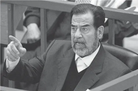  ?? 2006 FILE PHOTO BY NIKOLA SOLIC, AP ?? Saddam Hussein was grudgingly admired for a time by some of his American guards.