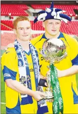  ??  ?? WEMBLEY WINNER: Jason Walker, left, with Lee McEvilly and the FA Trophy in 2010