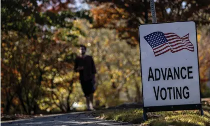  ?? Photograph: Carlos Barría/Reuters ?? A man arrives to cast his ballot during early voting for the midterm elections at the Smyrna Community Center in Smyrna, Georgia, on Friday.