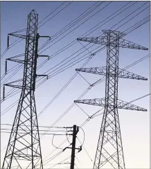  ?? File photo ?? Power lines at an electricit­y station. One of the biggest concerns for municipali­ties is the cost of energy, where frequent volatility can lead to pricing spikes throughout the year that become difficult to afford.