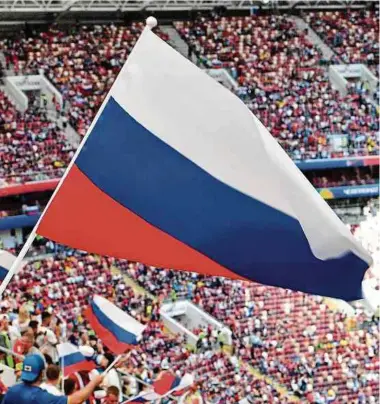  ?? Foto: AFP ?? Die russische Hymne darf bei Sport-Großereign­issen nicht gespielt oder gesungen werden, die russische Fahne nicht auf Teamkleidu­ng getragen oder gehisst werden.
