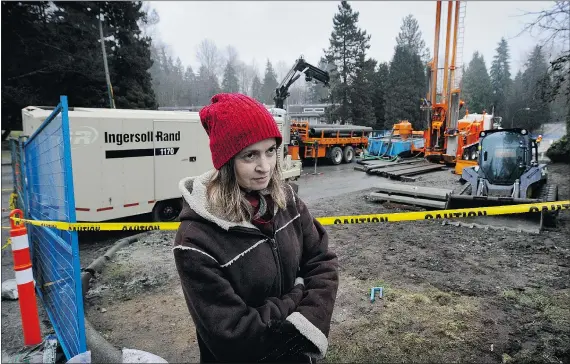  ?? MARK VAN MANEN/PNG ?? Concerned resident Kerry LeCorre stands near the site of a sinkhole on Cecile Drive connected with the tunnel-boring machine for the Evergreen Line in Port Moody on Sunday. A sinkhole opened up on nearby Chateau Place in October.