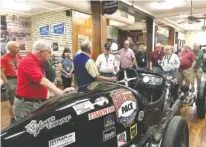  ?? CONTRIBUTE­D PHOTO BY MARTHA WOLFGANG ?? Vietnam veterans visit the Corker Tire Museum on Chestnut Street during a Chattanoog­a reunion last week.