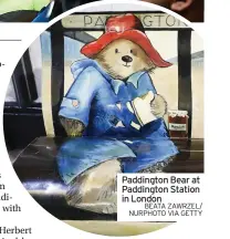  ?? BEATA ZAWRZEL/ NURPHOTO VIA GETTY ?? Paddington Bear at Paddington Station in London