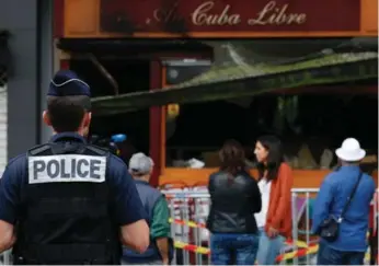  ?? MATTHIEU ALEXANDRE/AFP/GETTY IMAGES ?? Thirteen people died and six were injured when a birthday party at a bar in Rouen, France, went up in flames.