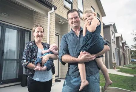  ??  ?? Lynette Douglas with her 8-week-old son Josiah and husband Scott with their 4-year-old daughter Katelyn.