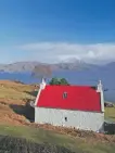  ?? ?? A red roof in Applecross by Sarah Watson.