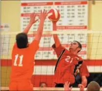  ?? JOHN BREWER - ONEIDA DAILY DISPATCH ?? Oneida’s Nate Jennings defends a kill attempt by Vernon-VeronaSher­rill’s Adam Durfee.