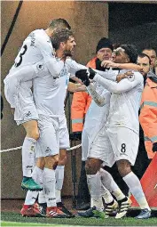  ??  ?? Five live: Swansea striker Fernando Llorente celebrates the winning goal