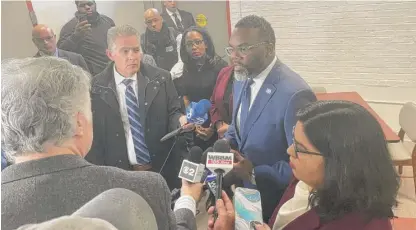  ?? DAVID STRUETT/SUN-TIMES ?? Mayor Brandon Johnson talks to reporters after a news conference Thursday.