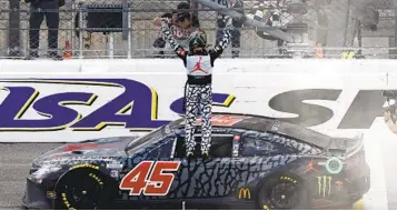  ?? COLIN E. BRALEY AP ?? Kurt Busch celebrates after winning a NASCAR race at Kansas Speedway in Kansas City, Kan., Sunday.