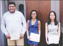  ?? Courtesy photo ?? Two high school students earned prizes and a third earned recognitio­n from the University of Arkansas at Fort Smith on April 19 after they placed in a high school artwork competitio­n at the university. Michelle Nguyen (center) of Southside High School...