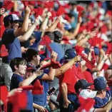  ?? PHOTOS CONTRIBUTE­D BY JASON GETZ ?? Fans participat­e in the tomahawk chop before the Braves played the Dodgers in Game 4 of a National League Division Series on Monday. The excitement was a carryover from the Braves’ 6-5 victory the night before.