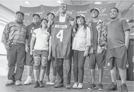  ?? Brett Coomer photos / Houston Chronicle ?? Deshaun Watson was joined by his family Friday at NRG Stadium, where he was introduced to his new team and home city.