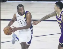  ?? KIM KLEMENT - THE ASSOCIATED PRESS ?? Indiana Pacers forward T.J. Warren (1) drives to the basket against Los Angeles Lakers forward Kyle Kuzma (0) during the third quarter of an NBA basketball game Saturday, Aug. 8, 2020, in Lake Buena Vista, Fla.