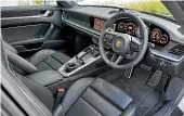  ??  ?? The Turbo’s interior is everything you expect from a 911.