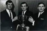  ??  ?? Members of the Clanna Gael Football Club with the Dublin County Senior Football Championsh­ip trophy at the Spa Hotel, Lucan in 1968. From left: Mick Byrne (Irish Internatio­nal soccer physio), Mossie O’Driscoll (Valentia and captain), Mickey Whelan...