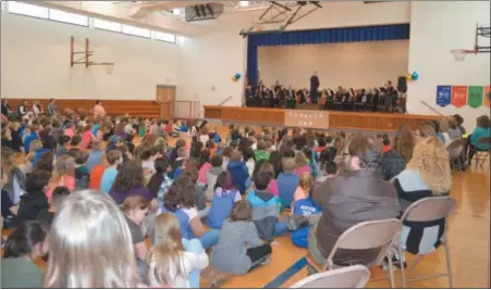  ?? SUBMitteD Photo — BerKS coUntY coMMUnitY foUnDation ?? reading Symphony orchestra performs Peter and the Wolf at Penn-Bernville elementary School last school year in the tulpehocke­n area School District, with Bethel elementary School students also attending. this school year will be the second year in a row for this performanc­e at PennBernvi­lle.