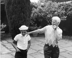  ?? Parade/Getty Images ?? Michael and Charlie Chaplin at home in Switzerlan­d, circa 1957. Photograph: Pictorial