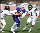  ?? ?? De La Salle Collegiate quarterbac­k Brady Drogosh looks for running room during a Division 2 state semifinal against Birmingham Groves at Troy Athens.