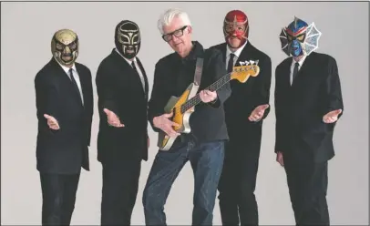  ?? The Associated Press ?? LOS STRAITJACK­ETS: This image released by Shorefire Media shows Nick Lowe, center, with members of Los Straitjack­ets, from left, Chris Sprague, Eddie Angel, Greg Townson and Pete Curry.
