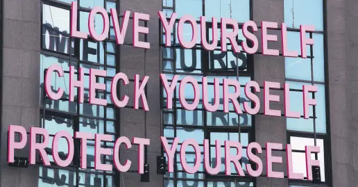  ??  ?? A message for breast cancer awareness decorates a building during a campaign for Breast Cancer Awareness Month, in Beirut, Lebanon, Oct. 11, 2018.