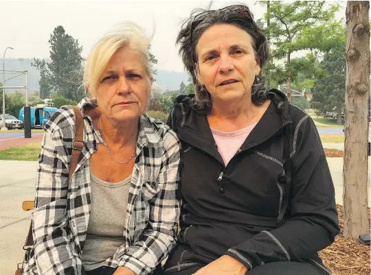  ?? JENNIFER SALTMAN/PNG ?? Benita Gies, left, and Cheryl Klaver were both evacuated from 100 Mile House Sunday and arrived in Kamloops, after previously being evacuated from their homes in 103 Mile and Lac La Hache, respective­ly, on Friday night.