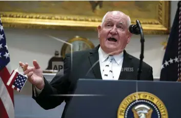  ?? AP PHOTO/EVAN VUCCI ?? Agricultur­e Secretary Sonny Perdue speaks at an event on the food supply chain during the coronaviru­s pandemic, in the Roosevelt Room of the White House, on May 19 in Washington.