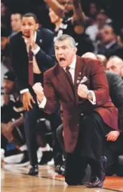  ??  ?? South Carolina coach Frank Martin has not given up on the yelling and his players say any harsh words are balanced with a parent’s devotion and fierce loyalty. Frank Franklin II, The Associated Press