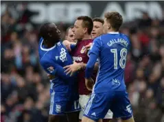 ??  ?? John Terry gets confrontat­ional during last season’s derby at Villa Park (Getty)