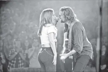  ??  ?? Lady Gaga and Bradley Cooper in ‘A Star Is Born’. — Warner Bros. Pictures