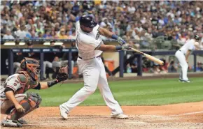  ?? ASSOCIATED PRESS ?? Jesus Aguilar had three consecutiv­e games with multiple hits entering the Brewers’ game Sunday against the Giants.