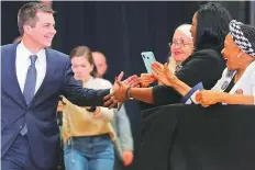  ?? AFP ?? Democratic presidenti­al candidate and former South Bend, Indiana Mayor Pete Buttigieg greets members.